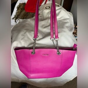 Beautiful Calvin Klein, fuchsia pink shoulder purse, and fabulous shape